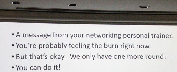 Slide from presentation: A message from your networking personal trainer. You're probably feeling the burn right now. But that's okay. We only have one more round! You can do it!